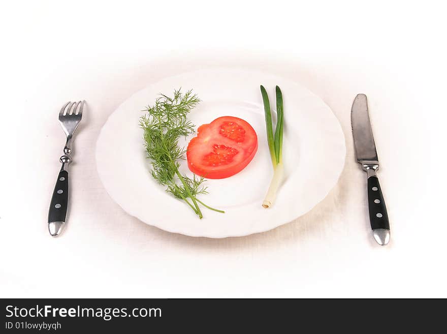 Tomato, dill and spring onion on plate. Tomato, dill and spring onion on plate