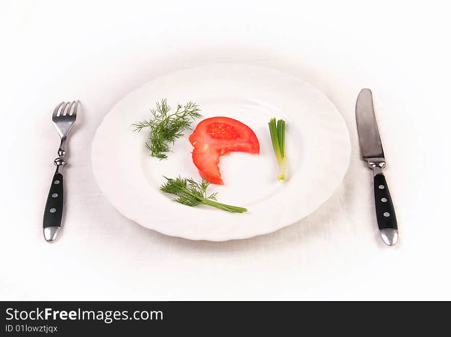 Tomato, dill and spring onion on plate. Isolated. Tomato, dill and spring onion on plate. Isolated.