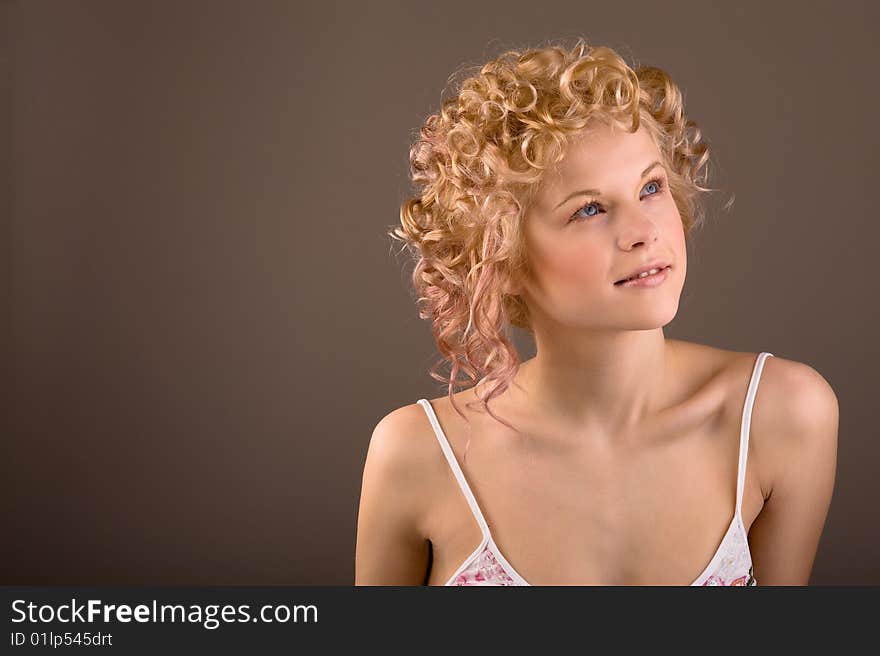 Portrait of a beautiful sexy woman with professional hair-style