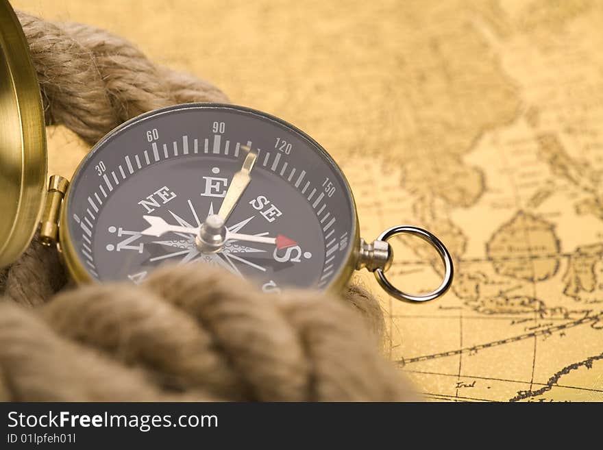 Old compass and rope