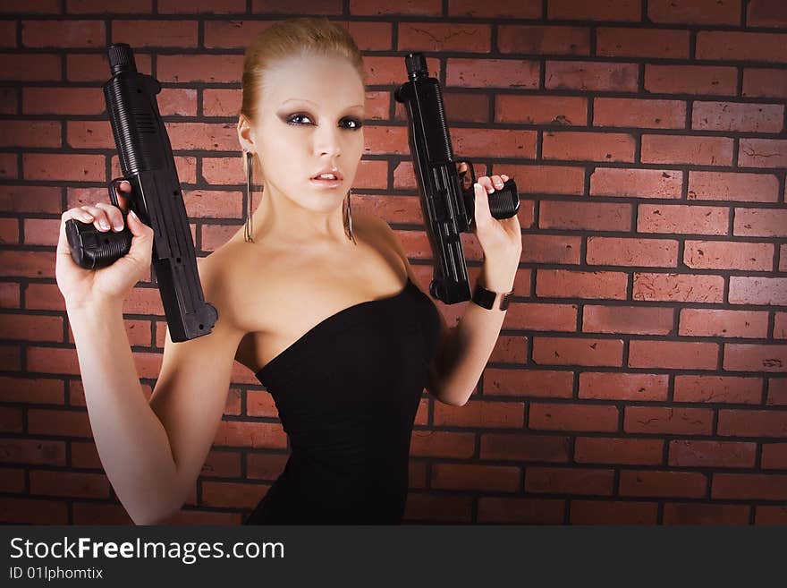 Pretty women playing secret agent holding guns. Pretty women playing secret agent holding guns