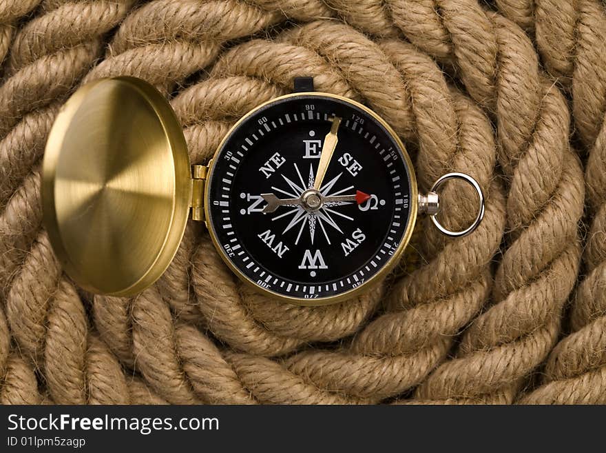 Old compass and rope