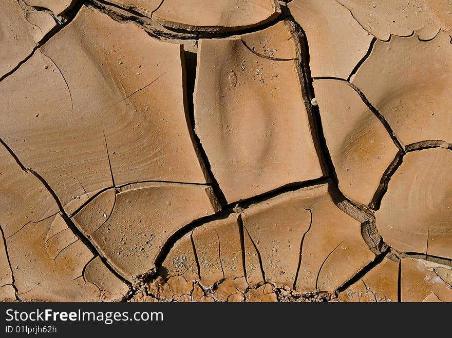 Dried and cracked desert soil. Dried and cracked desert soil