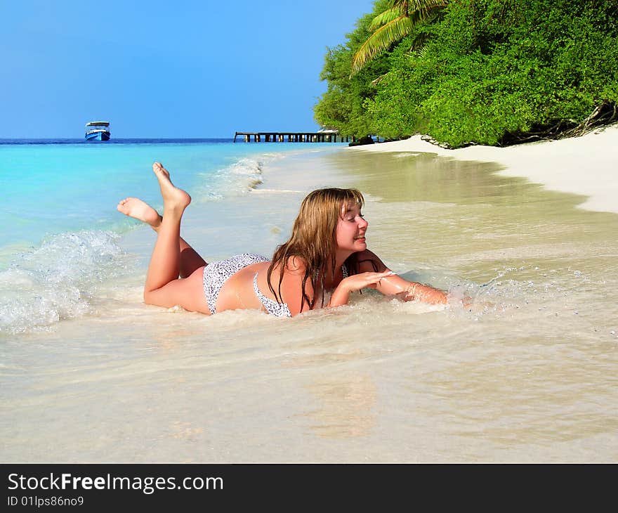 Beautiful Young Girl On The Beach