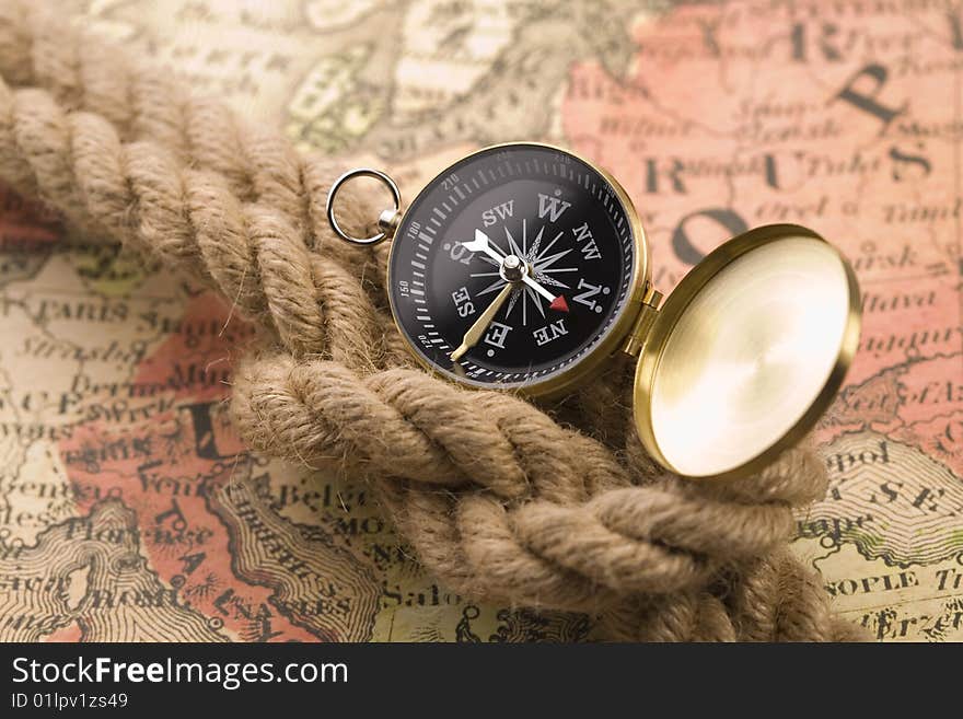 Old compass and rope