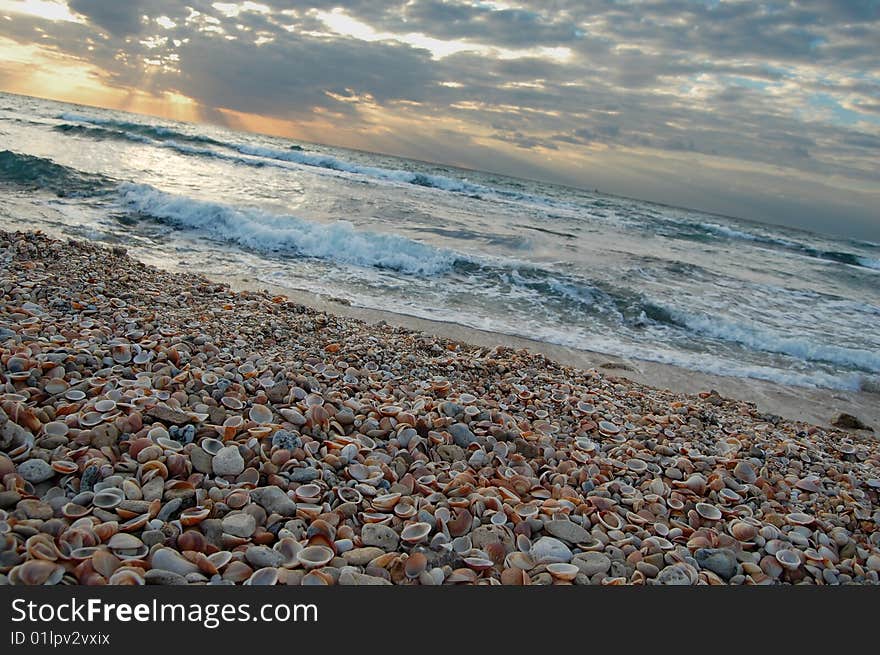 Sunset on the sandy beach . Sunset on the sandy beach