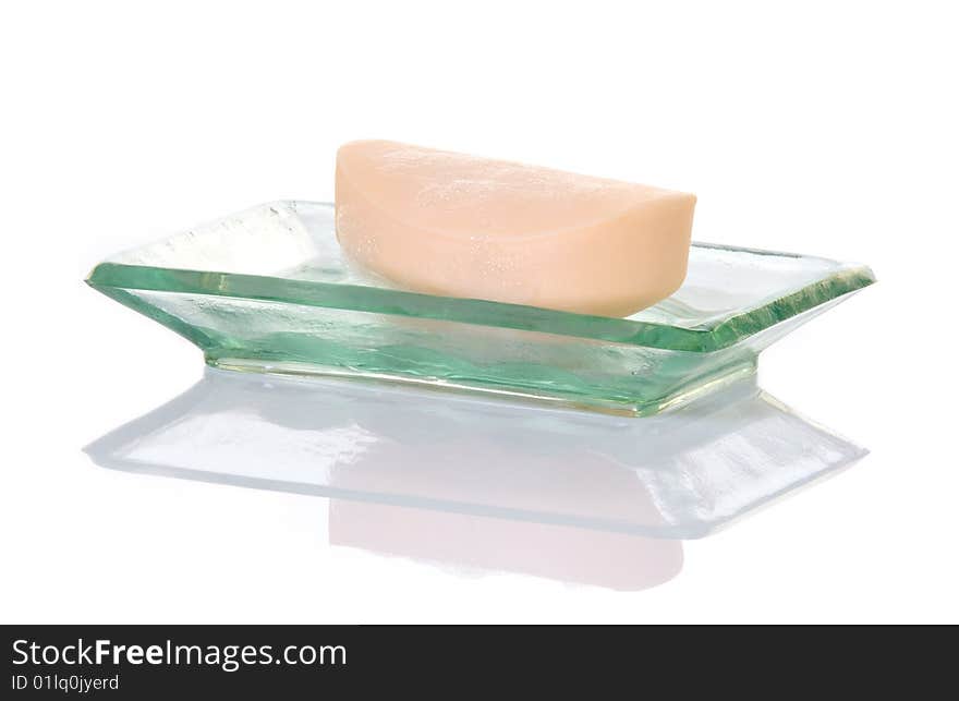 Bar of Soap on Green Glass Dish