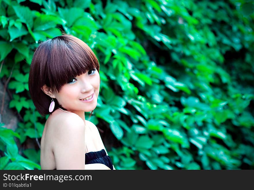 Chinese pretty girl in a park