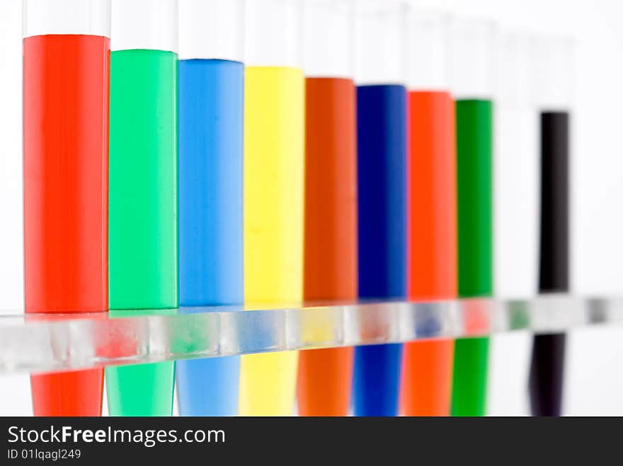 Test tube with colored water on white background. Test tube with colored water on white background