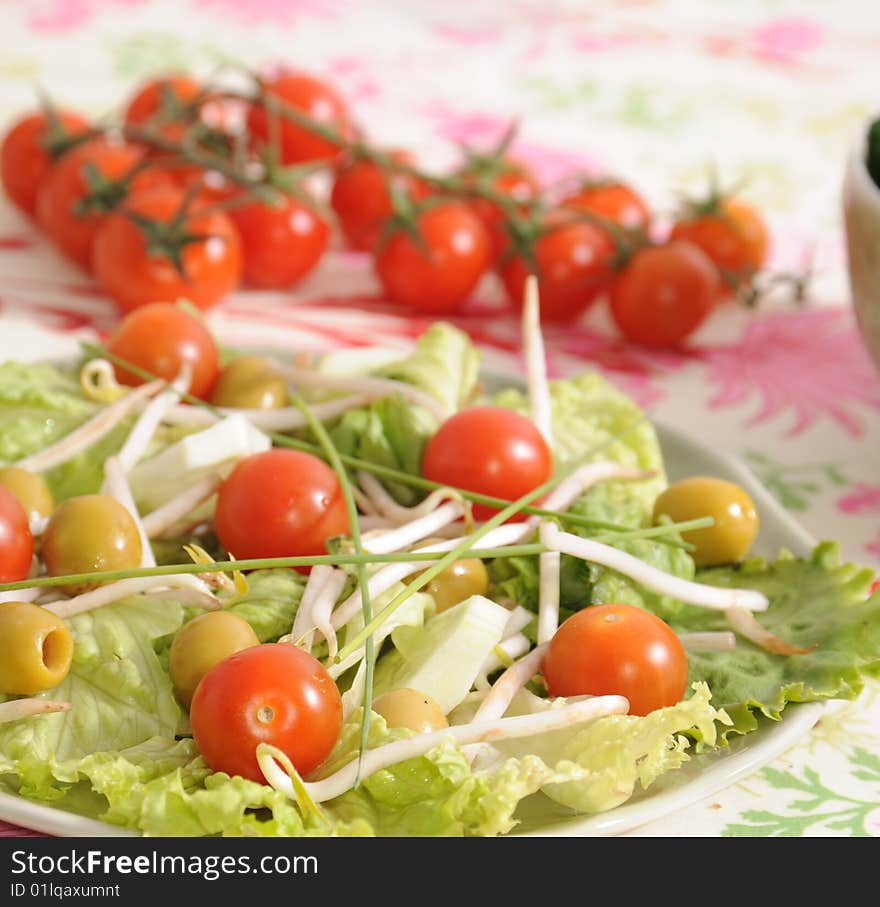 Salad of tomatoes, soia, olives and cucumbers. Salad of tomatoes, soia, olives and cucumbers