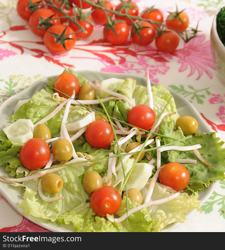 Salad of tomatoes, soia, olives and cucumbers. Salad of tomatoes, soia, olives and cucumbers