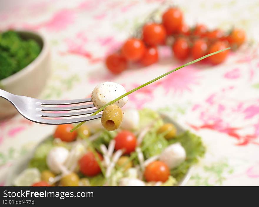 Salad of tomatoes, soia, olives and cucumbers. Salad of tomatoes, soia, olives and cucumbers