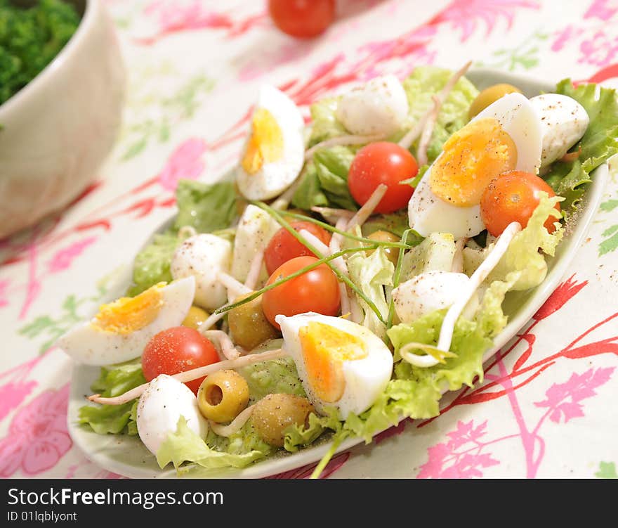 Salad of tomatoes, soia, olives and cucumbers. Salad of tomatoes, soia, olives and cucumbers