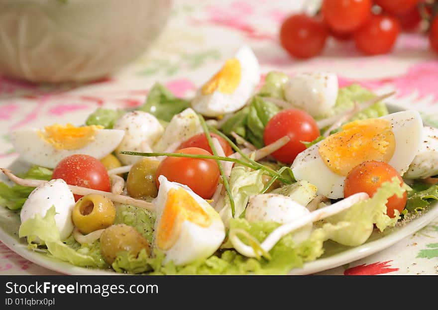 Salad of tomatoes, soia, olives and cucumbers. Salad of tomatoes, soia, olives and cucumbers