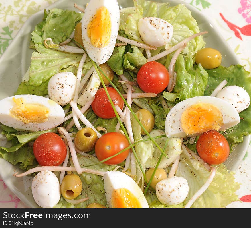 Salad of tomatoes, soia, olives and cucumbers. Salad of tomatoes, soia, olives and cucumbers