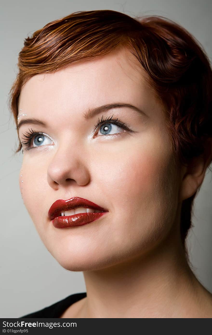 Close up portrait of lovely red-head young woman. Close up portrait of lovely red-head young woman