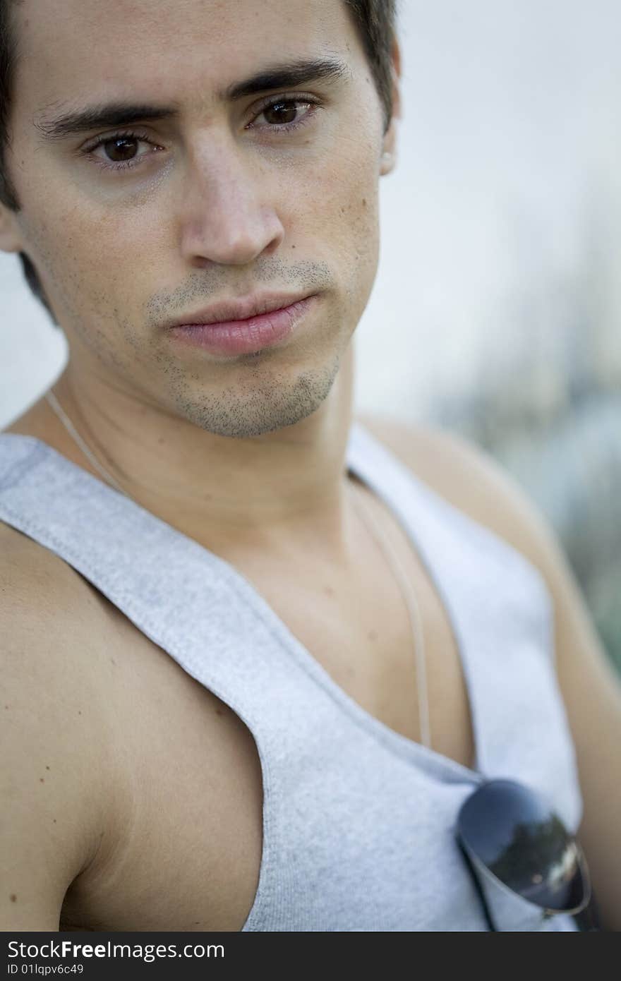 A young male model from Brazil in outdoors photograph. A young male model from Brazil in outdoors photograph.