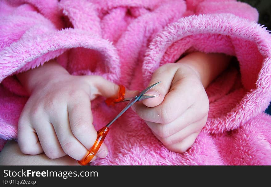 Child cuts nails