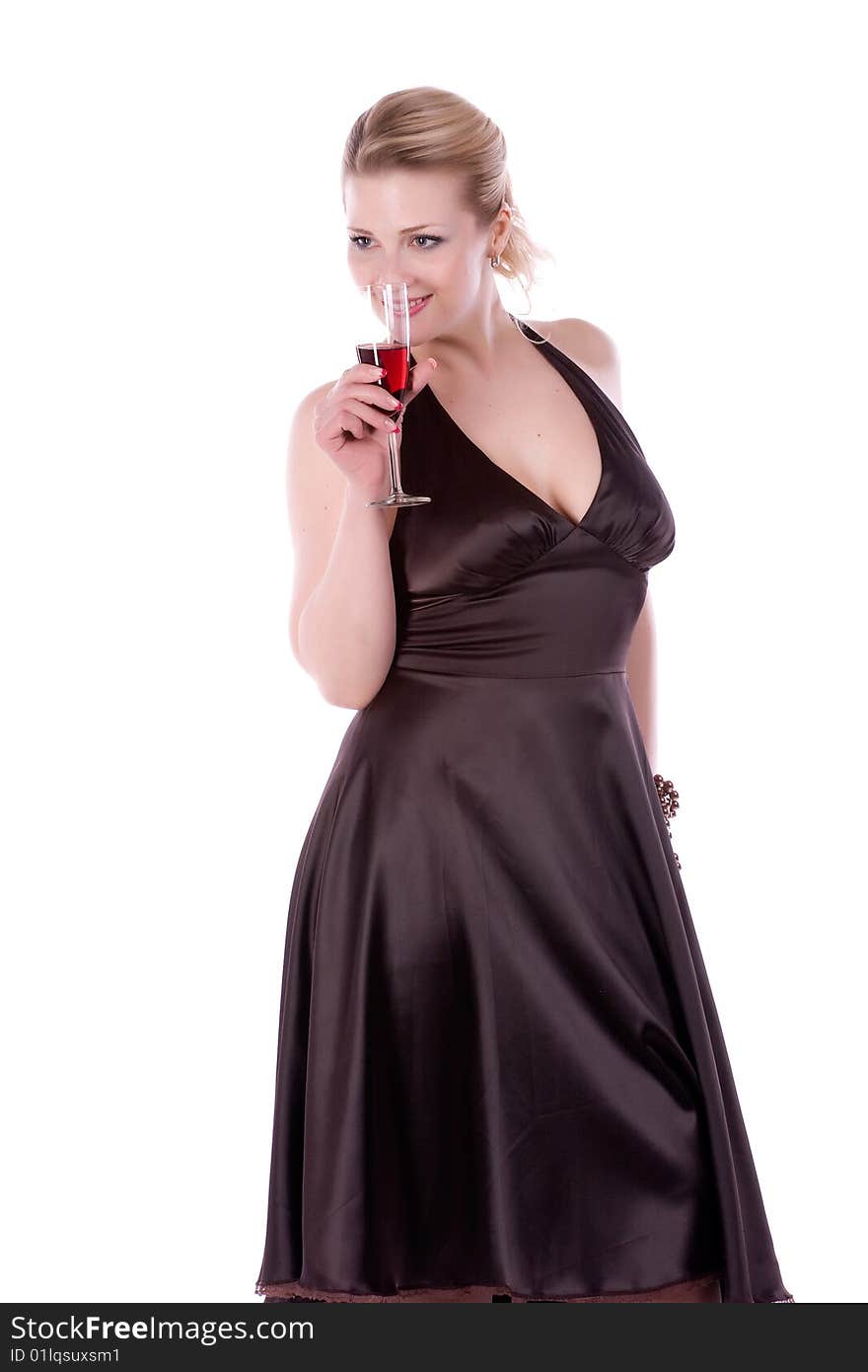 Woman in brown dress with a glass of wine on a white background. Woman in brown dress with a glass of wine on a white background