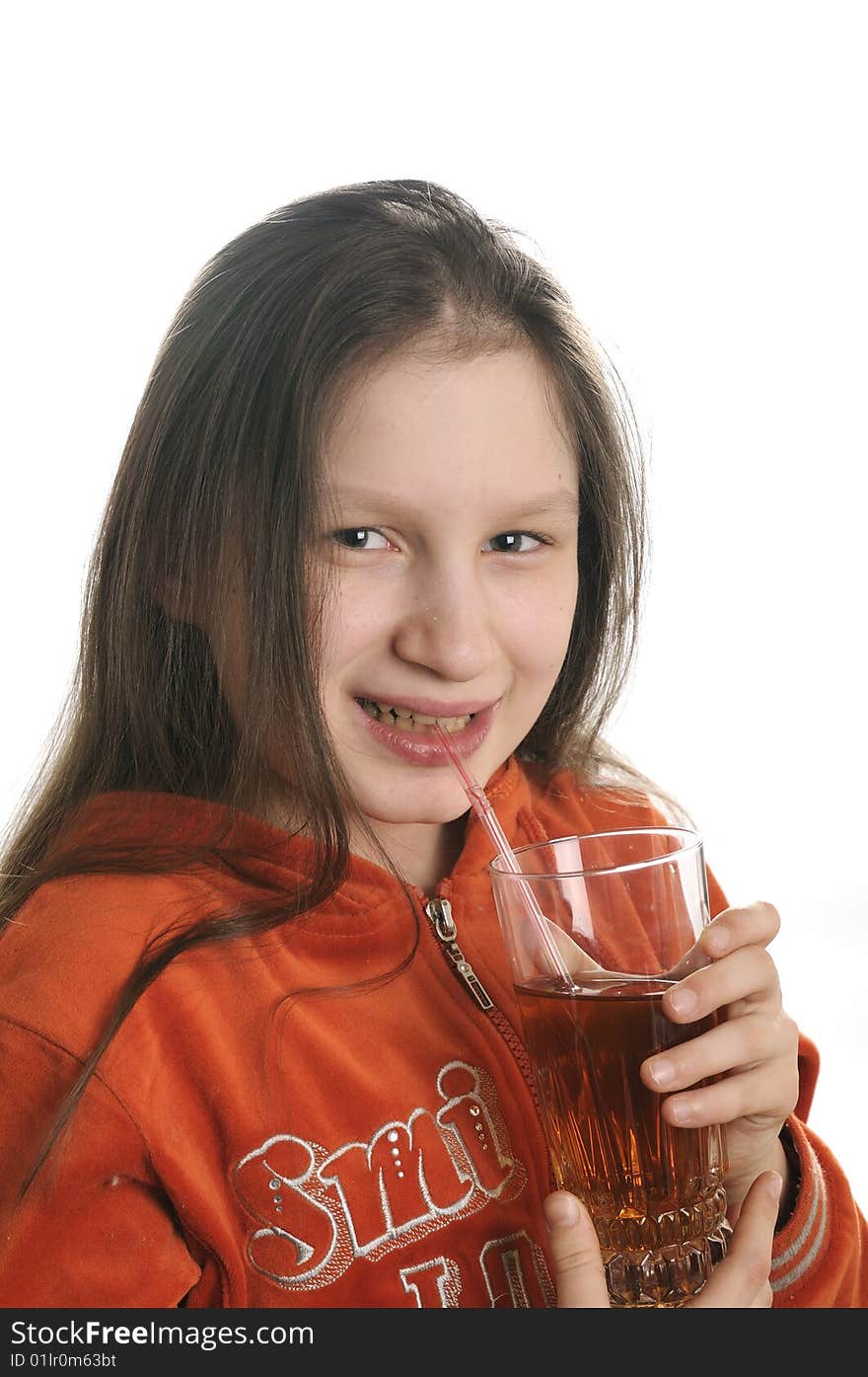 Young girl reading a book and drinking a fresh juice. Young girl reading a book and drinking a fresh juice