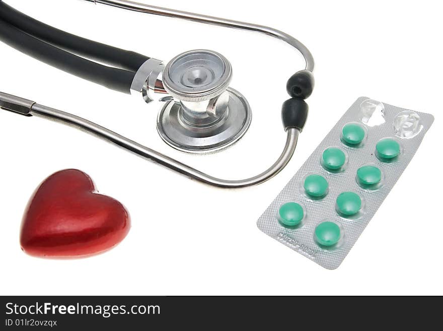 Stethoscope and heart isolated on the white. Stethoscope and heart isolated on the white