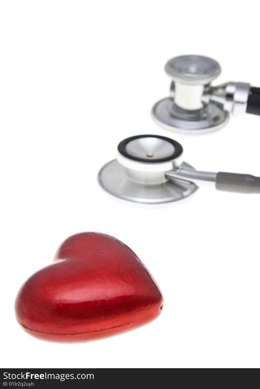 Stethoscope and heart isolated on the white. Stethoscope and heart isolated on the white