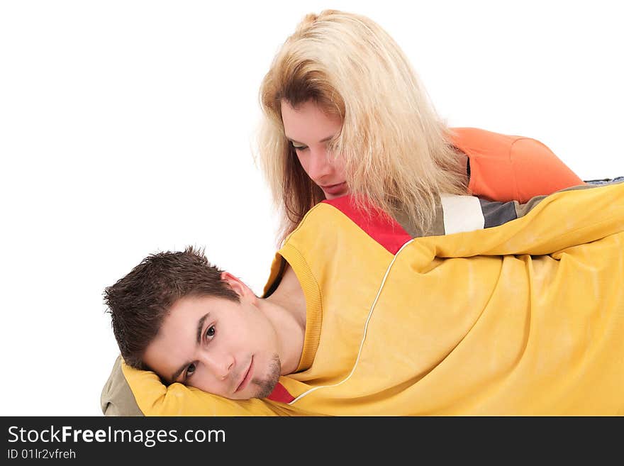 Portrait of young couple relaxing, studio shot. Portrait of young couple relaxing, studio shot