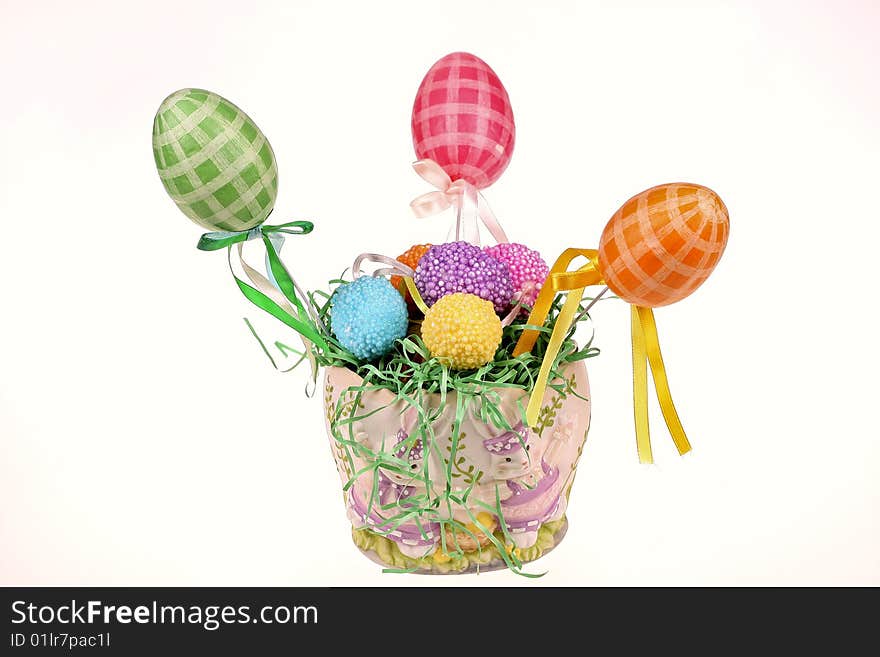 Easter eggs in the bucket isolated on white background