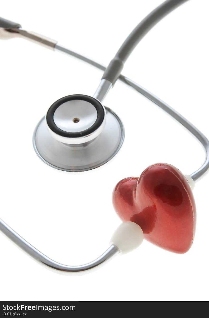 Stethoscope and heart isolated on the white. Stethoscope and heart isolated on the white