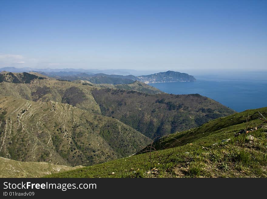 Beautiful view from the hills around Genoa. On the background the famous mounth of Portofino Italy. Beautiful view from the hills around Genoa. On the background the famous mounth of Portofino Italy