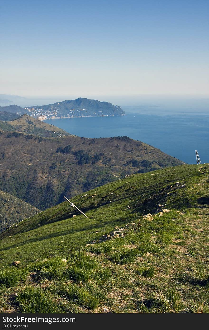 Beautiful view from the hills around Genoa. On the background the famous mounth of Portofino Italy. Beautiful view from the hills around Genoa. On the background the famous mounth of Portofino Italy