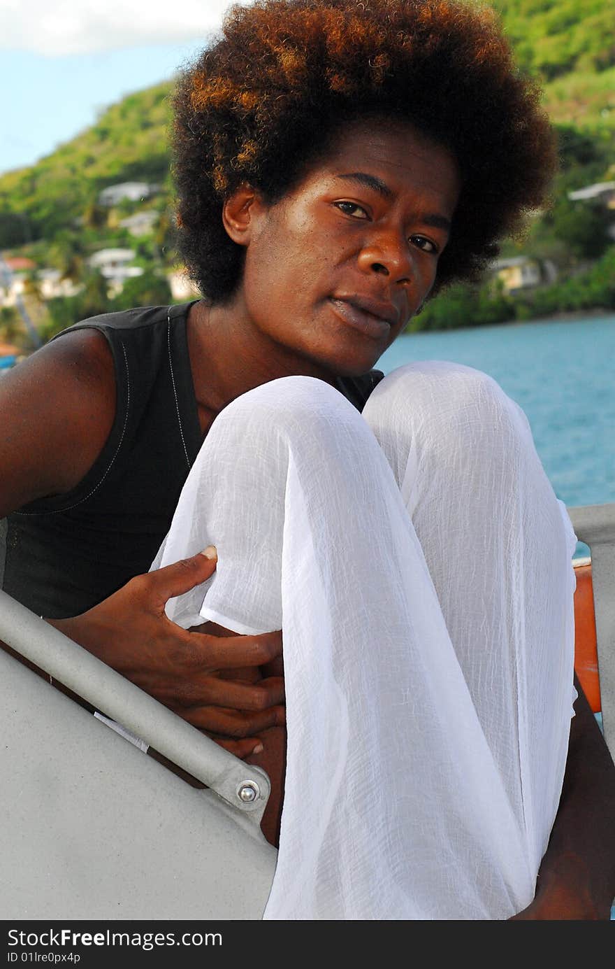 Face of black woman with natural afro hair style on yacht. Face of black woman with natural afro hair style on yacht.