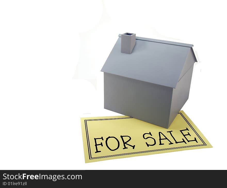 Scale model house with for sale sign. Scale model house with for sale sign.