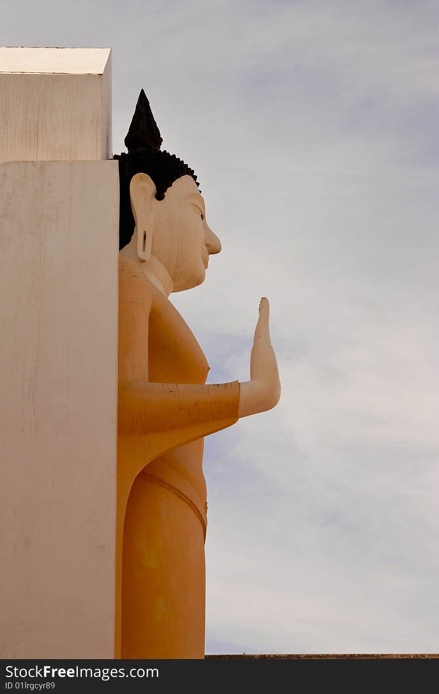 Standing Buddha image in Wat Yai, Pitsanulok province, Thailand