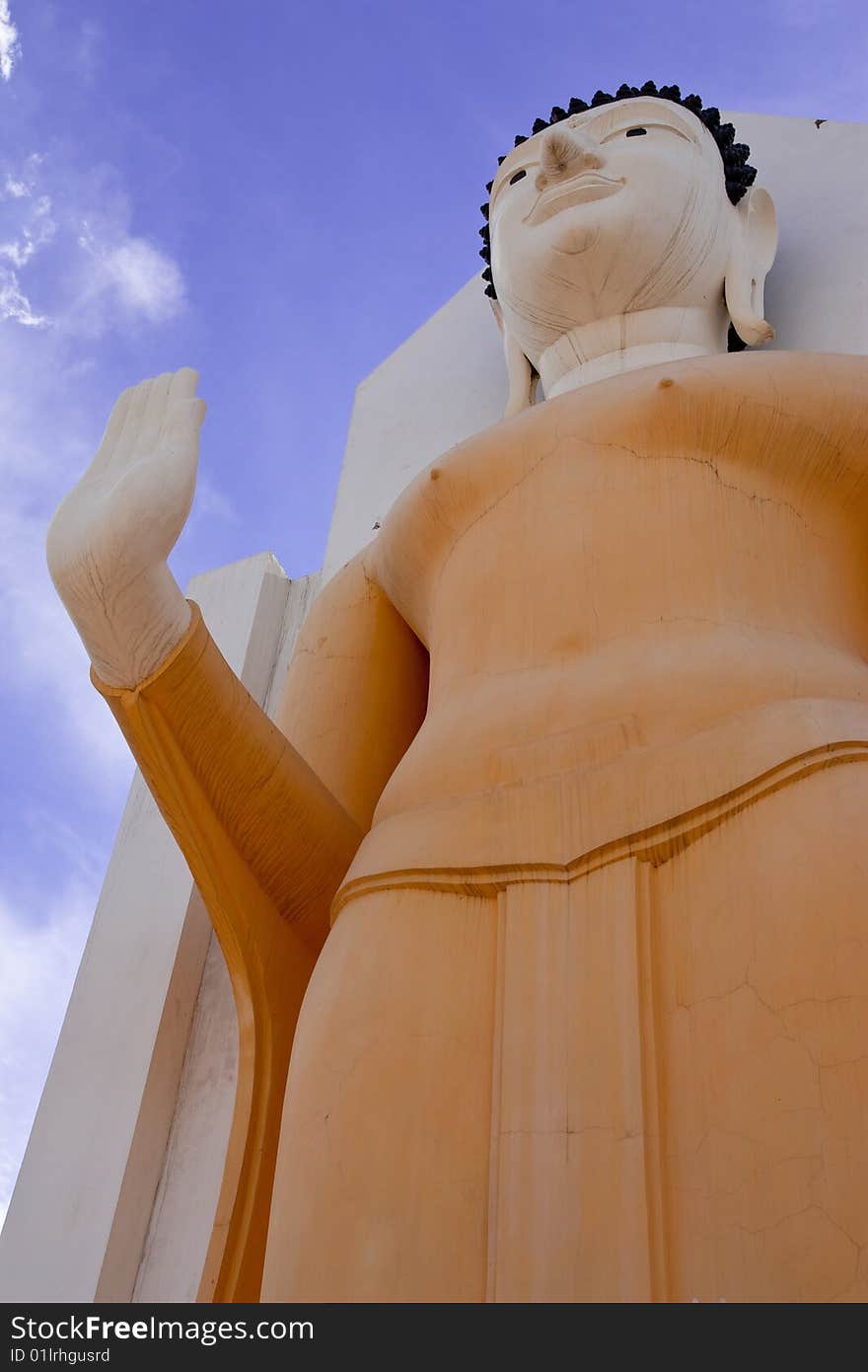 Standing Buddha image in Wat Yai, Pitsanulok province, Thailand