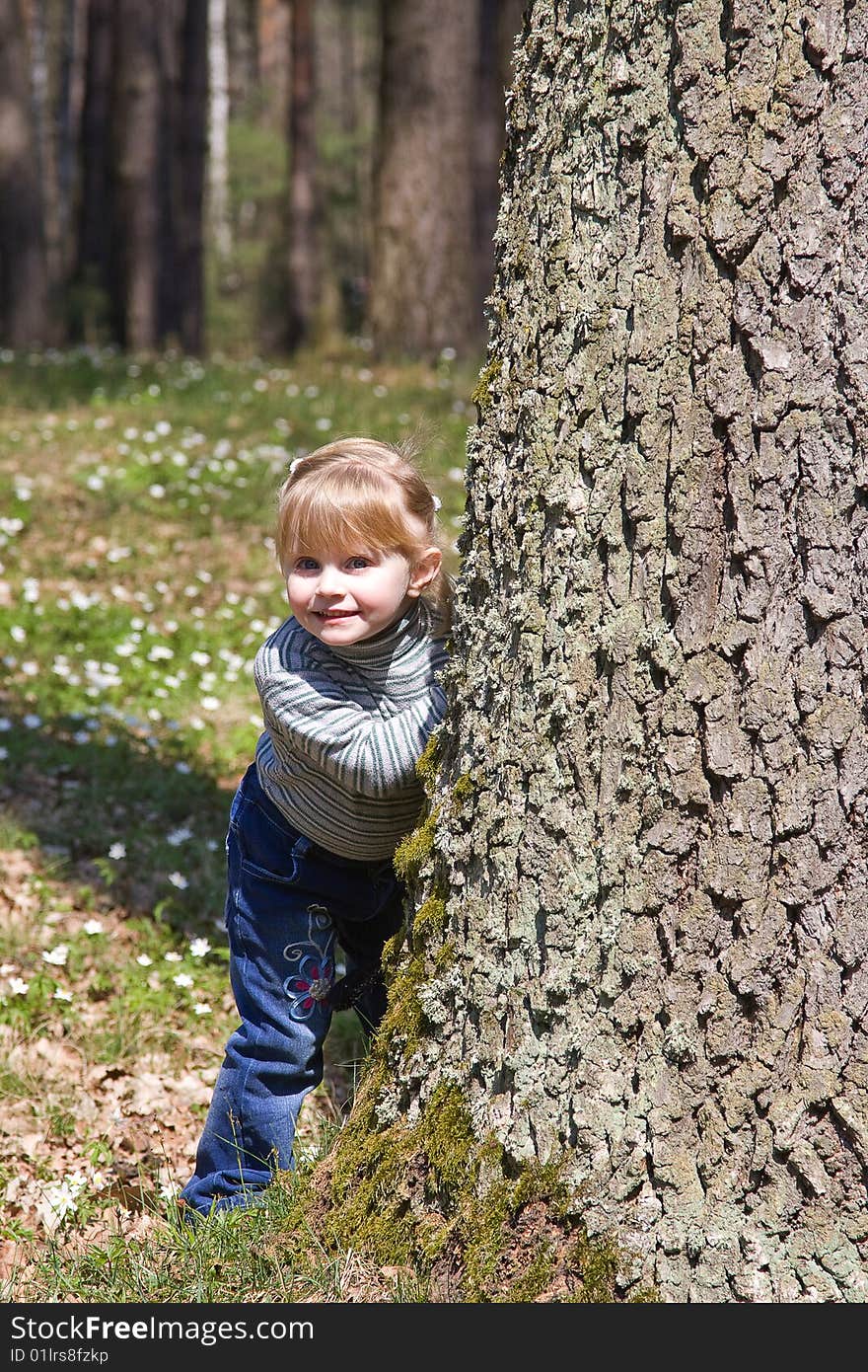 Beautiful smiling baby on the nature