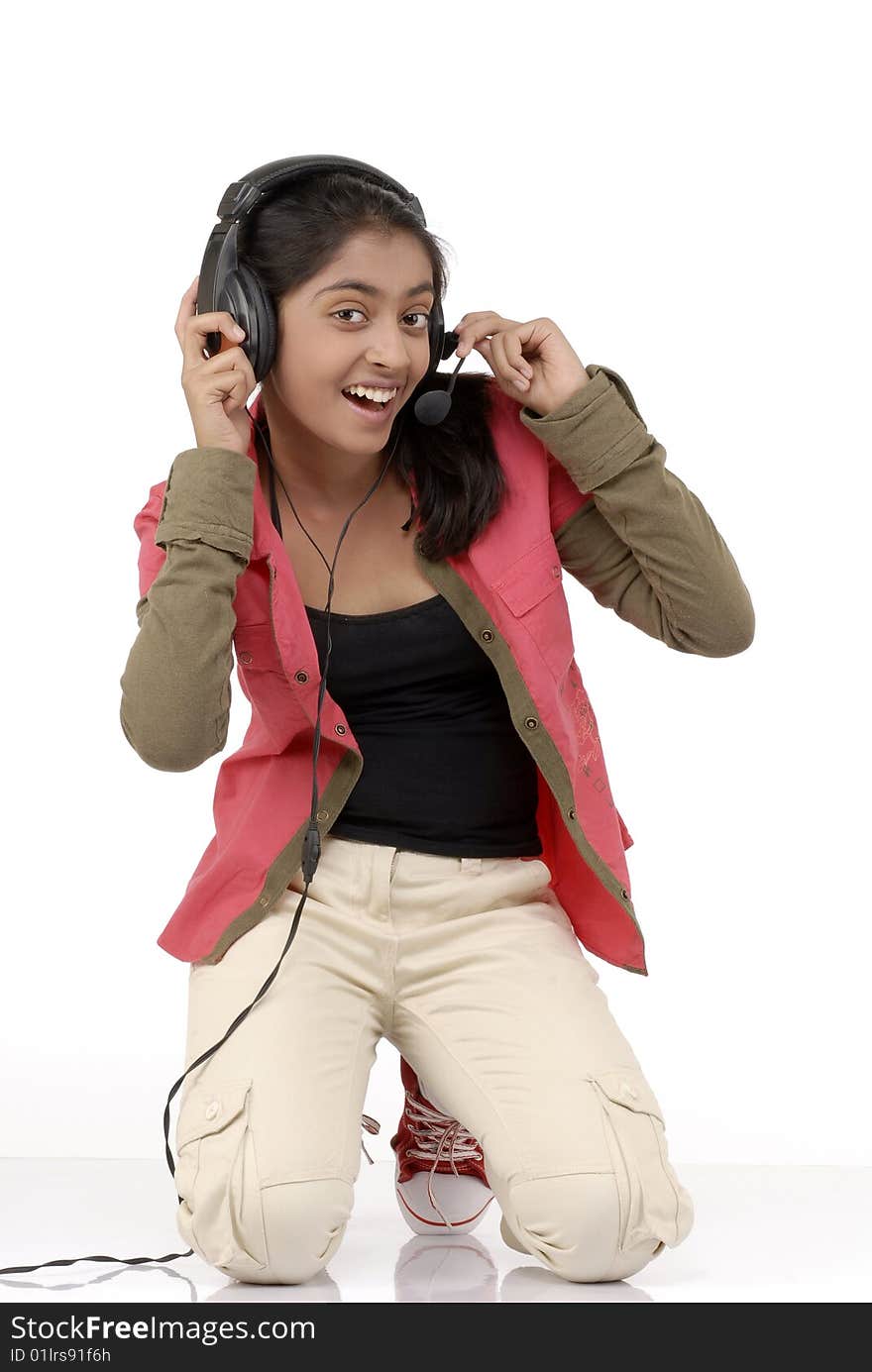 Young beautiful girl listening music in headphone. Young beautiful girl listening music in headphone