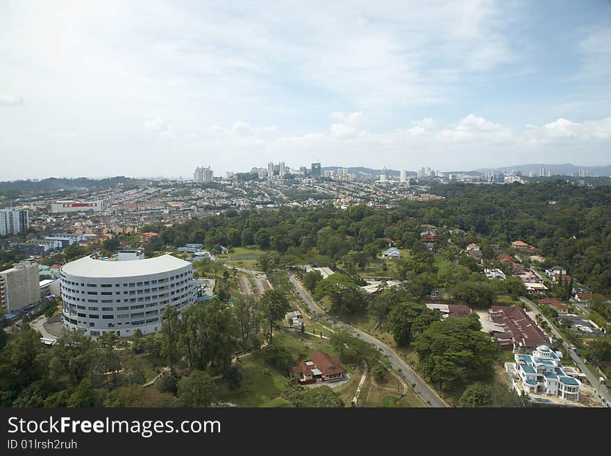 Aerial view of jungle and city