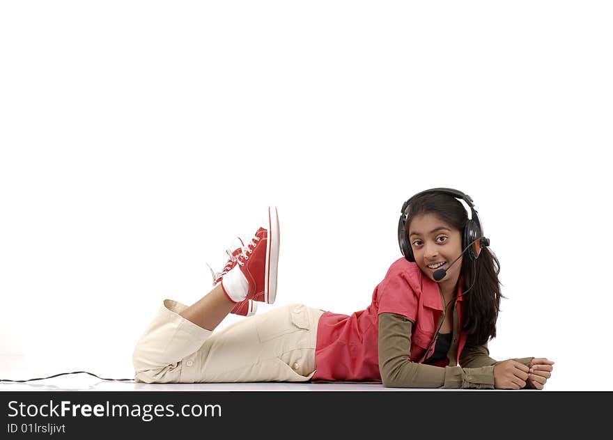 Young beautiful girl listening music in headphone. Young beautiful girl listening music in headphone