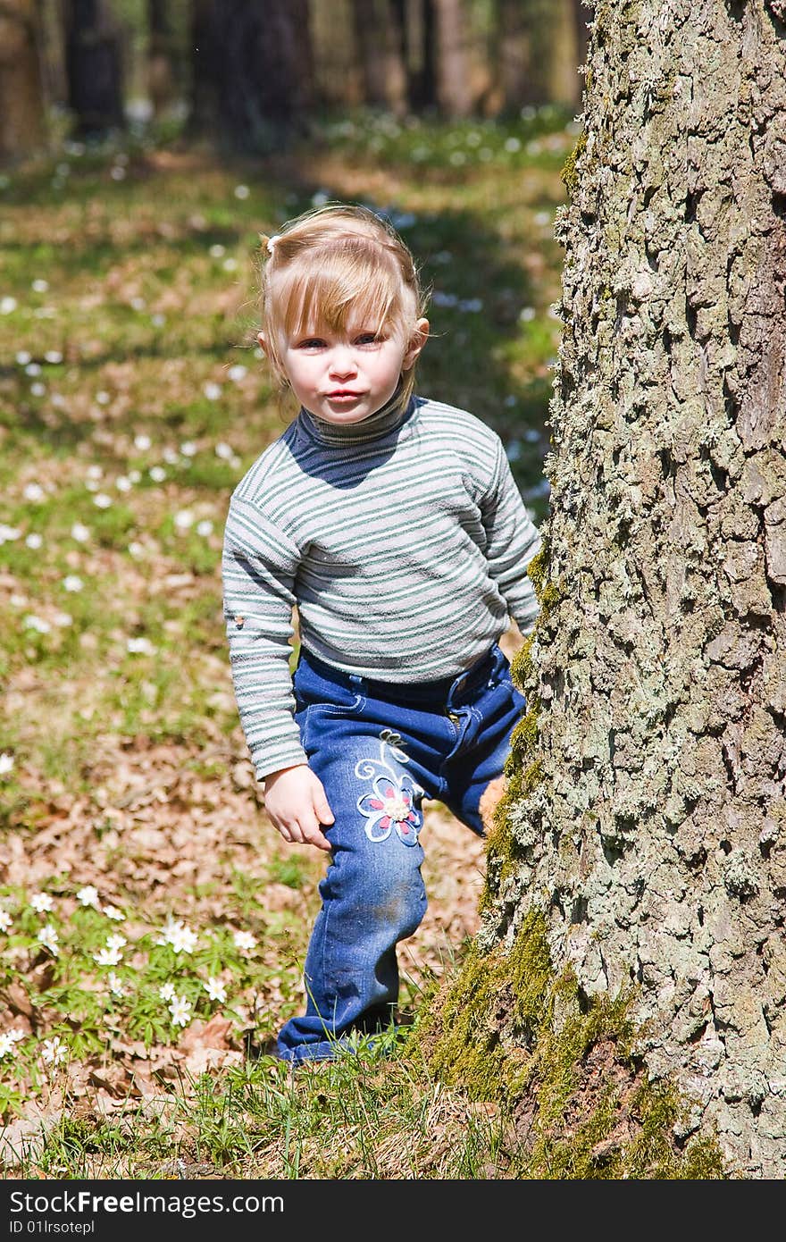 Beautiful smiling baby on the nature