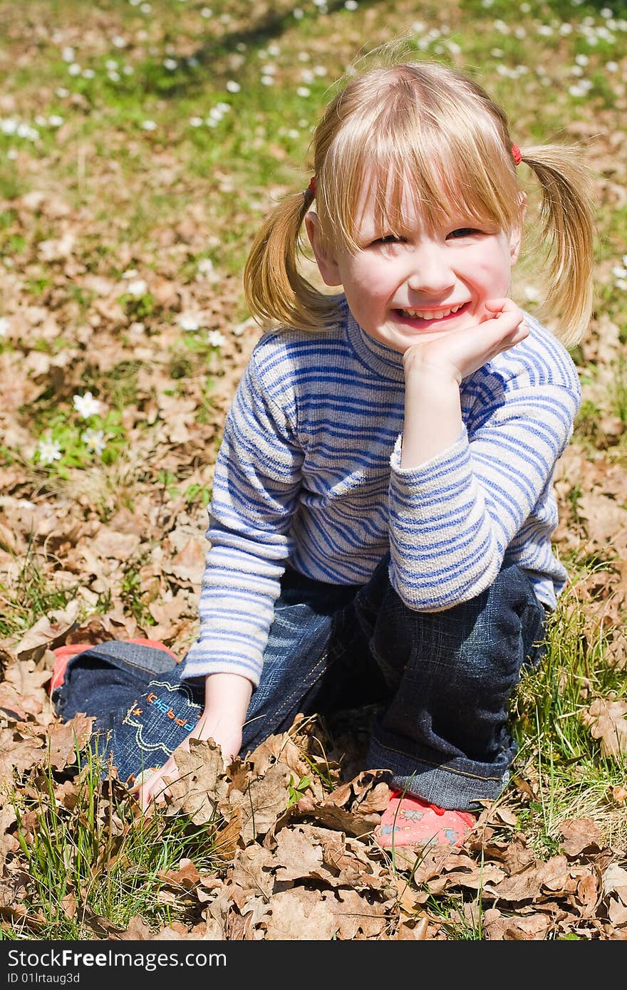 Beautiful smiling baby on the nature