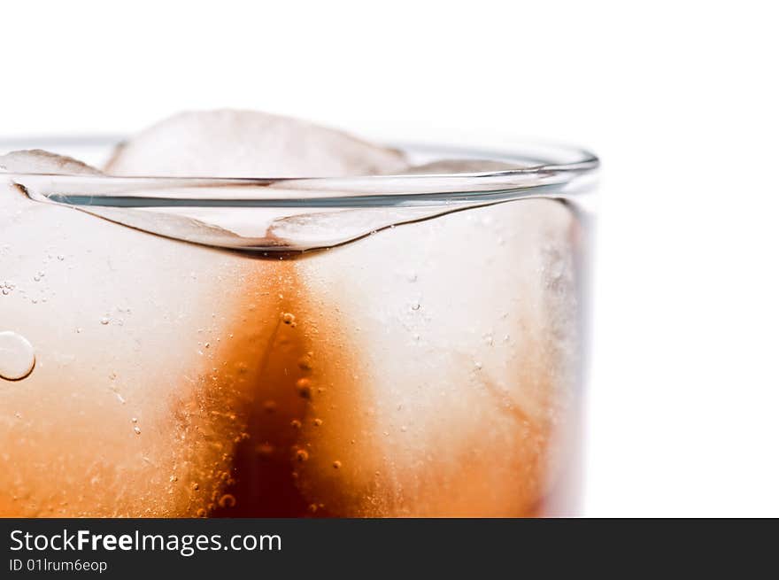 Glass of cola isolated on the white background