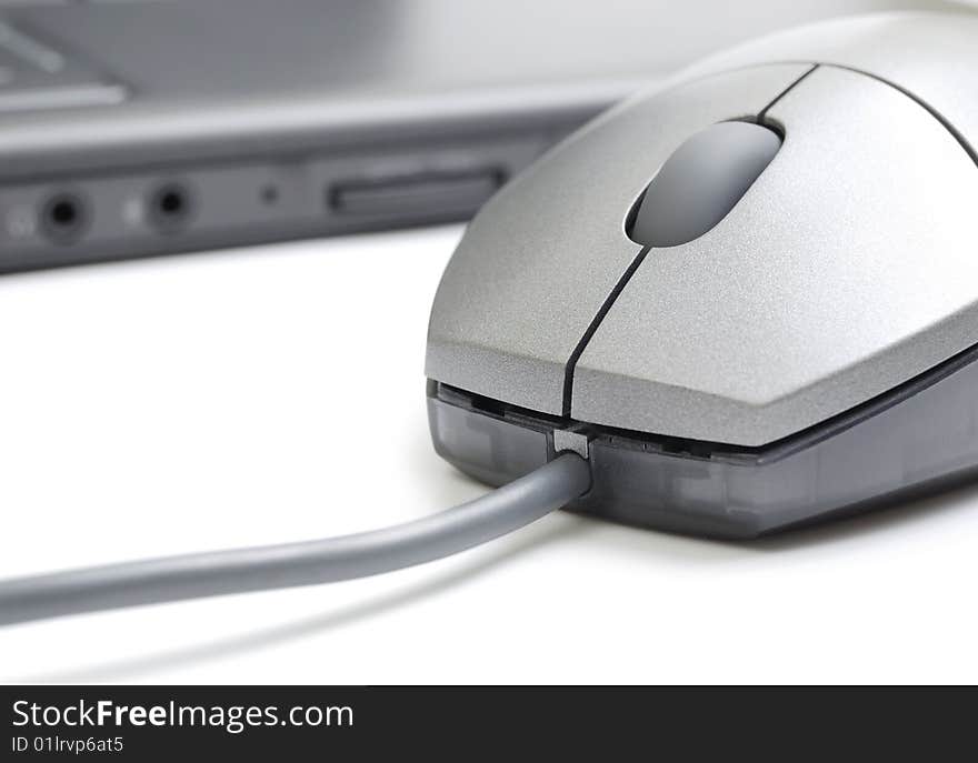 Closeup computer mouse. IT style.