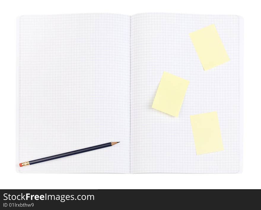 Blue pencil and yellow sticker on squared page. Pattern. Clipping path. Blue pencil and yellow sticker on squared page. Pattern. Clipping path.