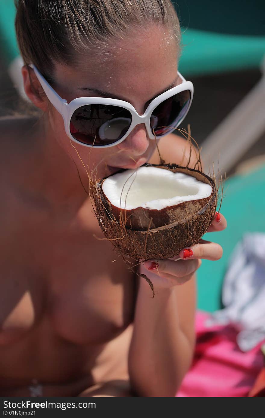 Woman drinking coconut milk