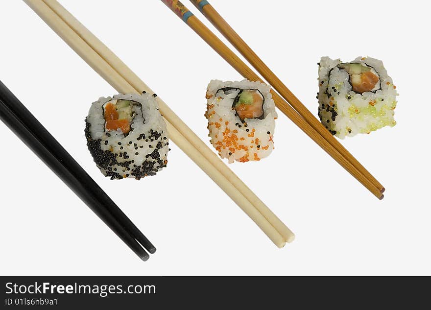 Sushi with chopsticks shot on white background