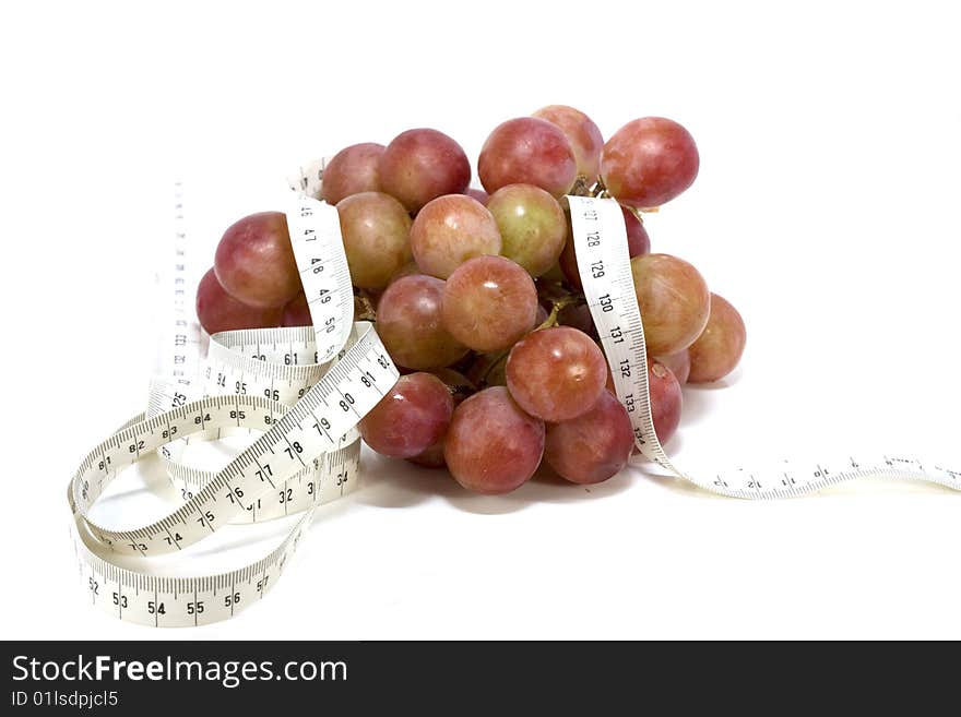 Juicy black grapes on a white background. Juicy black grapes on a white background