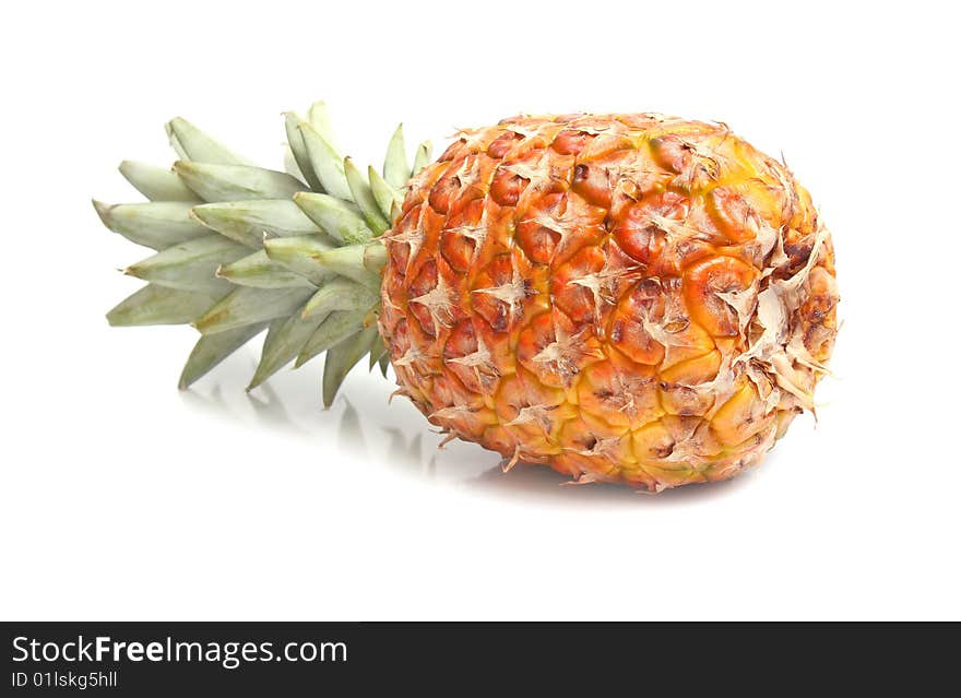 Ripe sweet pineapple isolated on white background