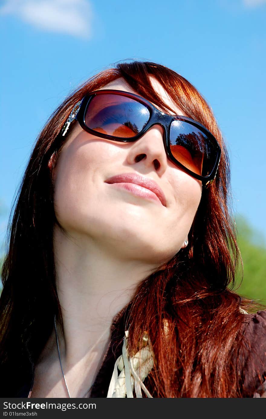 Happy woman looking up