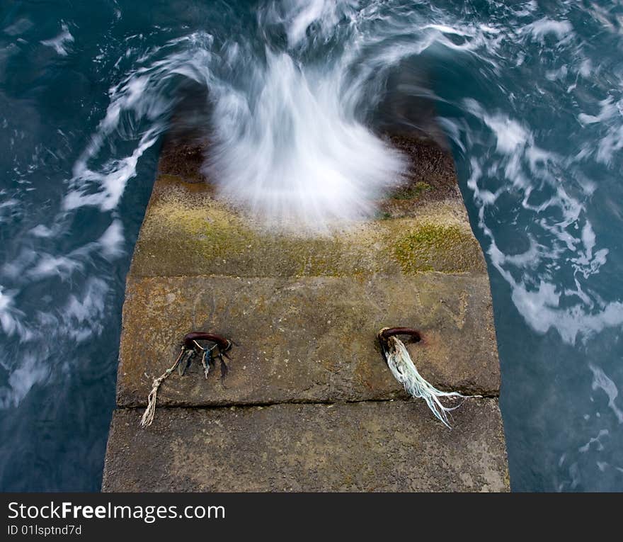 Sea and stone pier